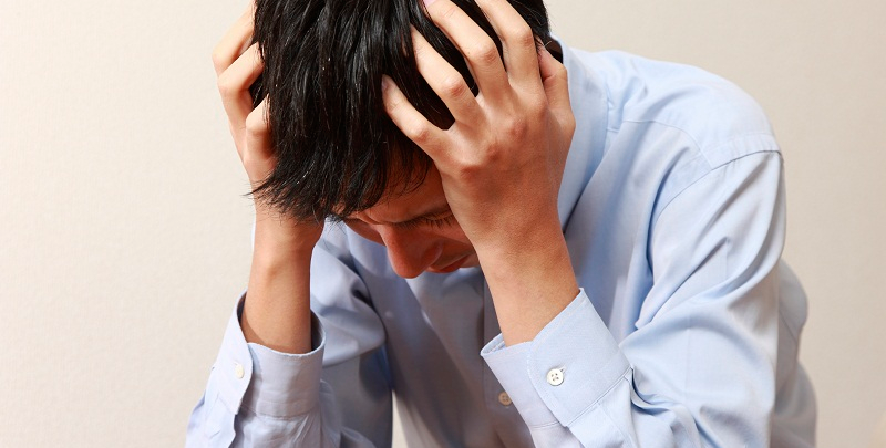 Person experiencing daily stress and fatigue